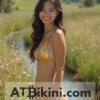 Kansas bikini contest, woman in Golden bikini in front of Kansas nature beauty